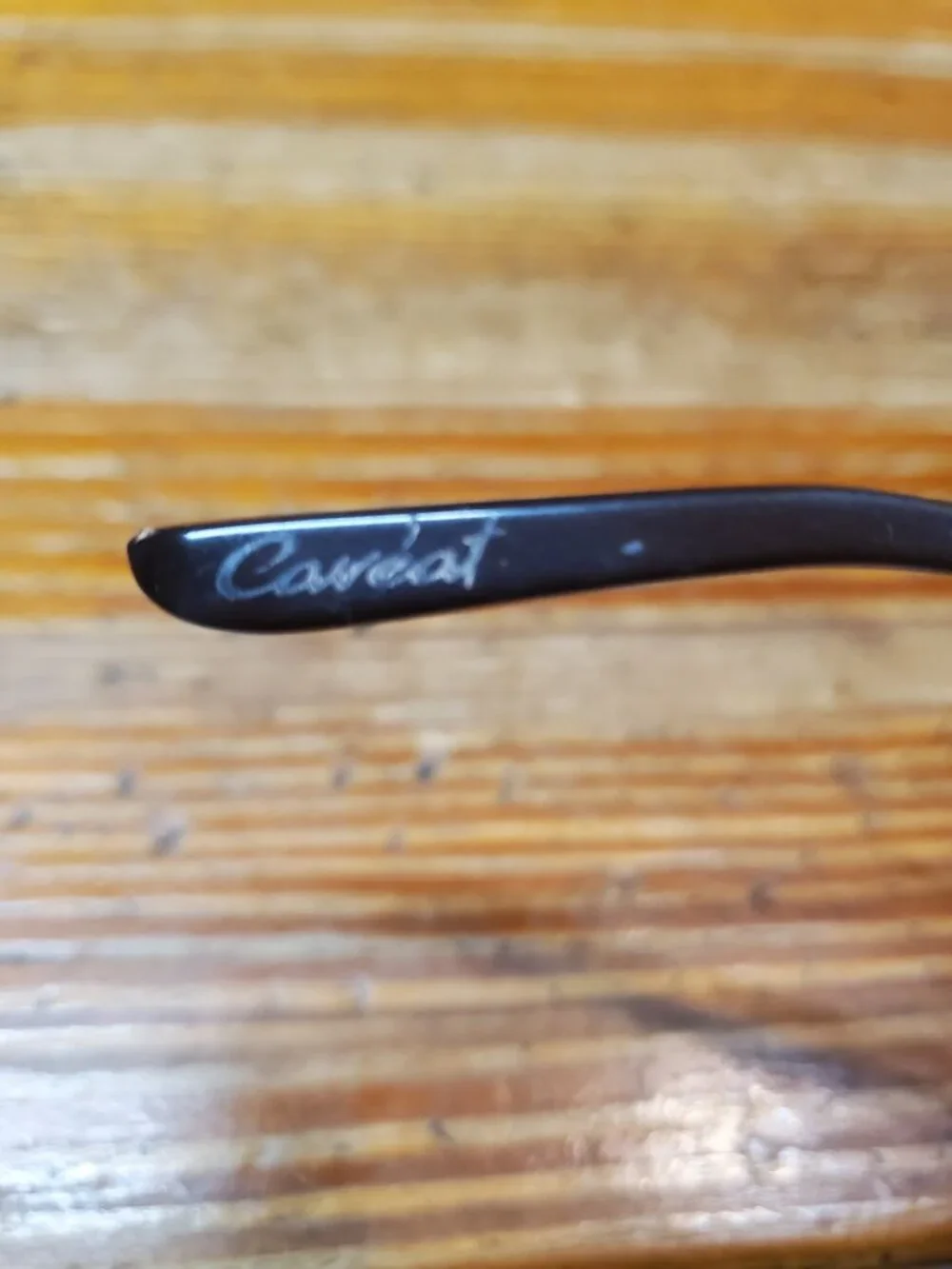 Oakley Caveat aviator sunglasses featuring a rose gold metal frame and warm brow